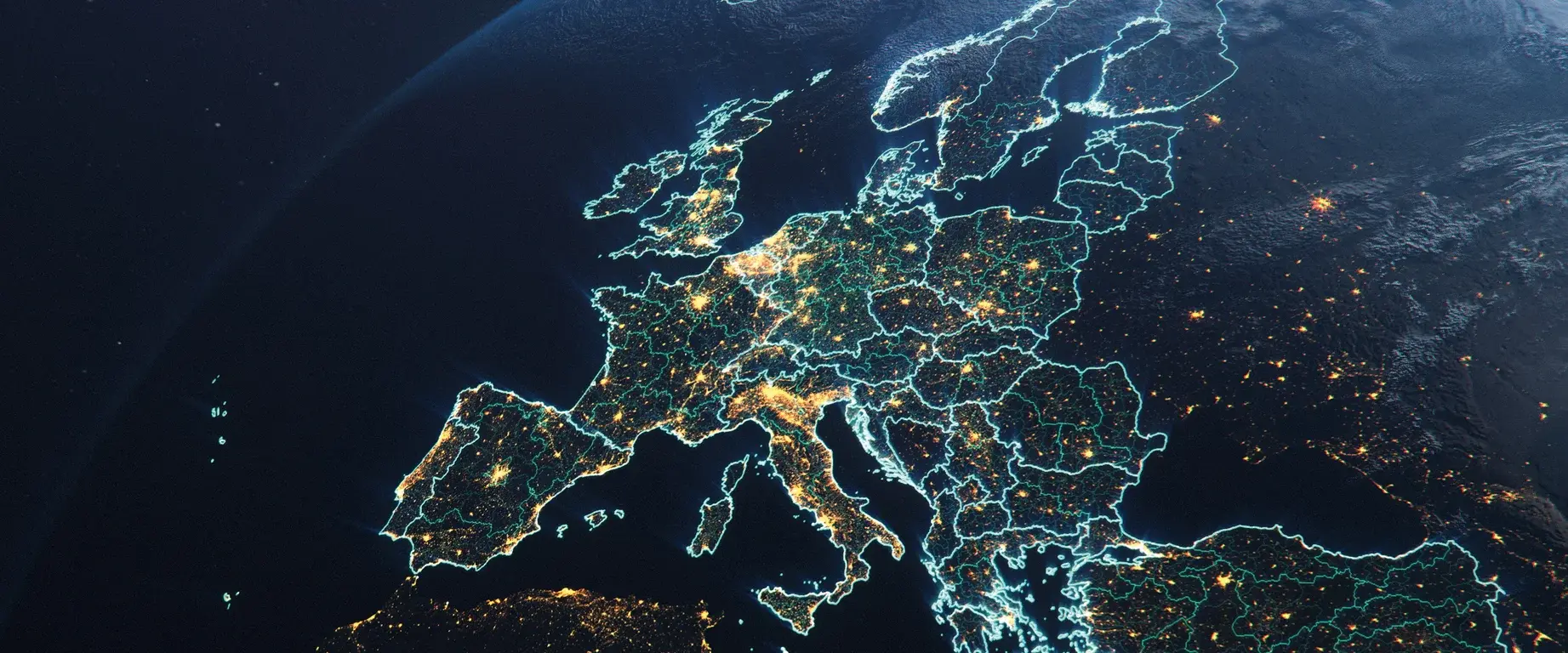 Europe at night from space with patches of light at the metropolitan areas