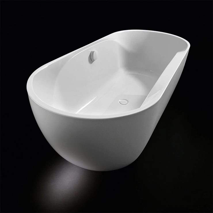 A white delphis bathtub against a black background